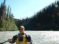 In_the_canyon_looking_upstream_at_raft.jpg (77kb)